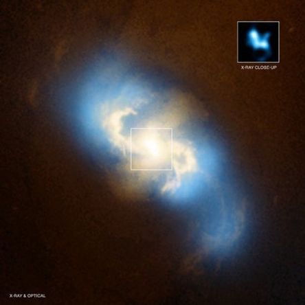 1.6億光年外旋渦星系發(fā)現(xiàn)超大質(zhì)量黑洞(圖)