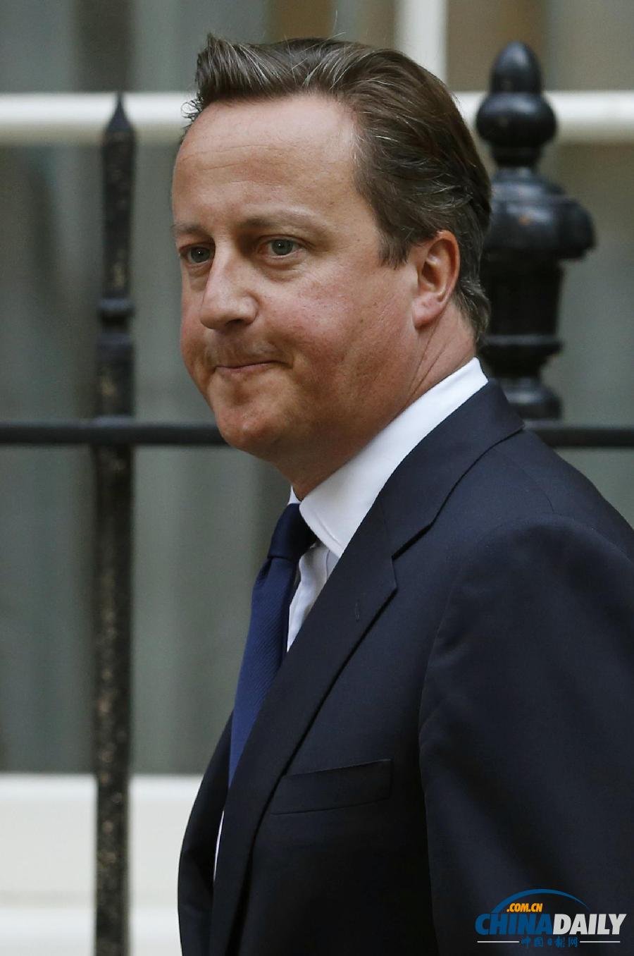 英國首相卡梅倫不敵議會反對 暫時(shí)擱置干預(yù)提議