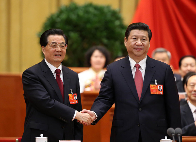 胡錦濤與習(xí)近平握手